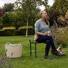 Flexi_Tub with lady sat on kneeler stool wearing Buckingham shoe.jpg